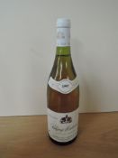A bottle of Puligny-Montrachet 1997 Domaine Jean Pascal & Fils, 13% vol, 75cl, stored in a