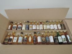 Thirty miniature bottles of Single Malt Whisky including 25 Year Linkwood, 8 Year Littlemill, 31