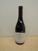 A bottle of Chambertin Grand Cru 1999 Red Burgundy Wine, Domaine Rossignol-Trapet, 13.5% vol,