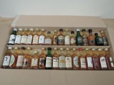 Thirty Two miniature bottles of Single Malt Whisky including Girvan single grain 14 year,