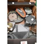 A small carton of assorted slate items including coasters, and clock faces sold alongside an agate