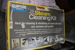 An Earlex steam cleaning kit in box.