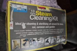An Earlex steam cleaning kit in box.