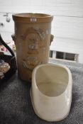 A vintage stoneware water filter AF and a ceramic slipper pot.