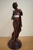 A 20th Century bronze effect figural sculpture, in the Art Nouveau style, measuring 47cm tall