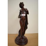 A 20th Century bronze effect figural sculpture, in the Art Nouveau style, measuring 47cm tall