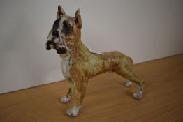 A contemporary studio pottery boxer dog study with mottled earthy toned glaze replicating brindle