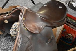 A leather saddle, of traditional design