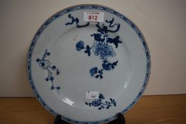 A pair of Victorian pearlware cabinet plates, hand painted with a foliate design within a blue and