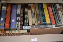 A carton containing a selection of assorted Folio Society books including Crime stories from the