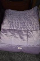 A satin effect lavender bed throw measuring 88 inches x 74 inches approx.