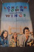 A vintage large 'Wings' advertising poster for the album London Town and an ABBA Greatest Hits