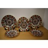 Six Royal Crown Derby Old Imari design plates, the largest measures 24cm in diameter