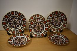 Six Royal Crown Derby Old Imari design plates, the largest measures 24cm in diameter