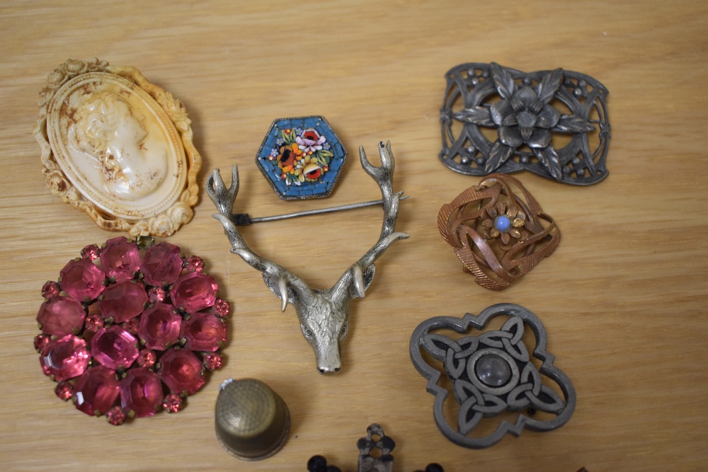 An assortment of costume brooches, including a large stags head, a Celtic knot motif example, - Image 2 of 3