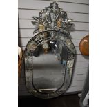 A large Venetian style mirror 125cm x 60.5cm.