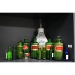 A Victorian Boots earthenware steam inhaler and an assorted collection of coloured glass medicine