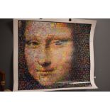 A photographic print depicting the Mona Lisa, made up of a collage of photographs.