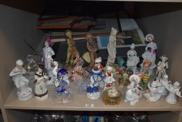 A large quantity of glass and ceramic figurines and animal studies including a bald Eagle and