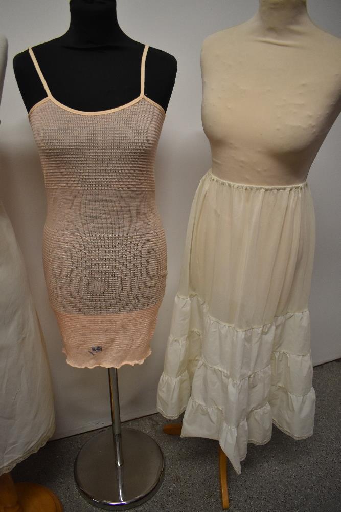 A selection of vintage lingerie, to include CC41 utility labelled knitted slip, 1930s peach slip and - Image 6 of 7