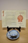 A collectable blue and white cup and saucer, reputedly from Ca Mau shipwreck, with certificate