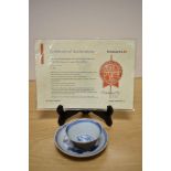 A collectable blue and white cup and saucer, reputedly from Ca Mau shipwreck, with certificate