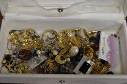 Two jewellery boxes containing an assortment of costume jewellery, including statement floral