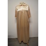 A vintage blush ivory coloured glossy satin nightdress.