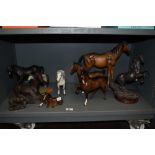 A collection of horse studies, including Beswick dapple grey, brown foal and brown mare.