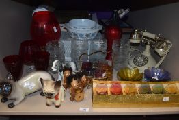 A large selection of assorted mid century glassware and ornaments including a kitsch telephone, a