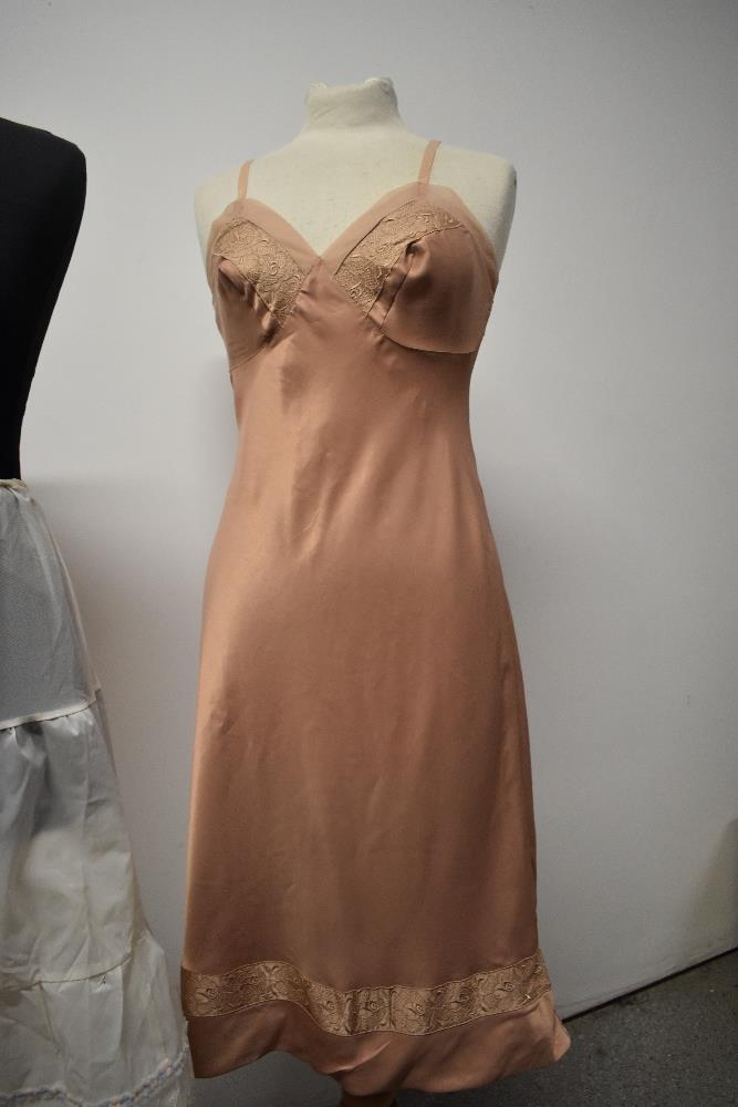 A vintage 1960s St Michaels slip, a 1950s/60s nylon petticoat and a Brettles nightdress. - Image 6 of 9