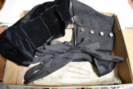 A selection of vintage gloves, belt and a pair of ladies spats.