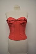 A 1950s Red boned bustier/ sun top, having Ric-Rac.