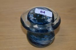 A blue mottled glass paperweight, of mushroom form.