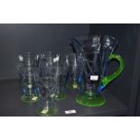 An Art Deco period etched glass lemonade set, comprising jug and six glasses