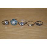 A collection of costume jewellery rings including a silver marcasite set double heart ring and a