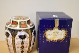 A Royal Crown Derby Old Imari patterned lidded ginger jar, measuring 22cm tall, with box