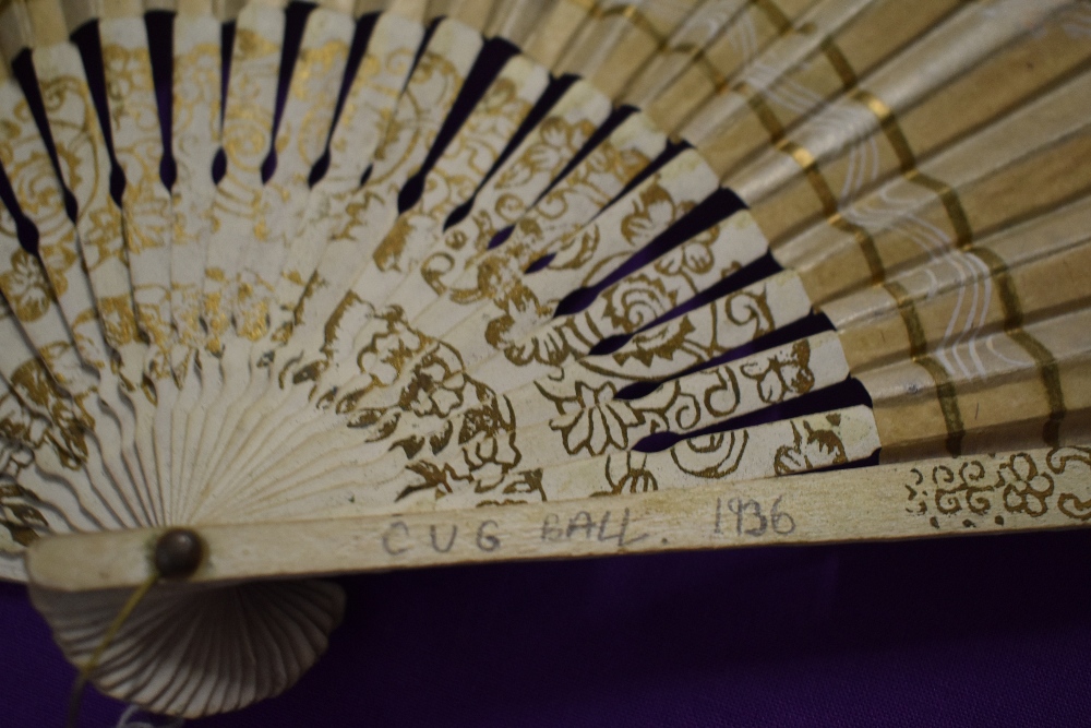 A vintage fan, having bone ribs, sold with another paper fan with hand painted decoration. - Image 2 of 6