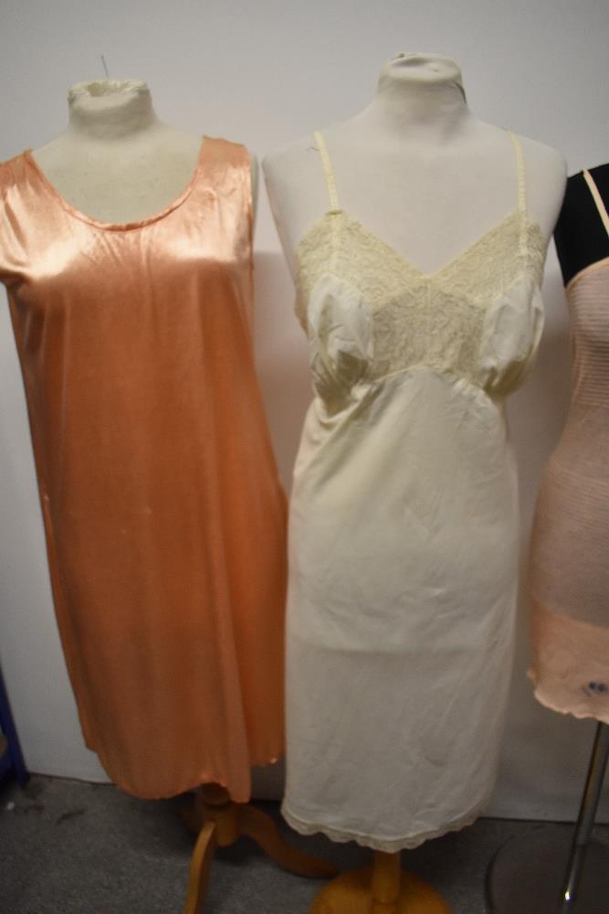 A selection of vintage lingerie, to include CC41 utility labelled knitted slip, 1930s peach slip and - Image 7 of 7