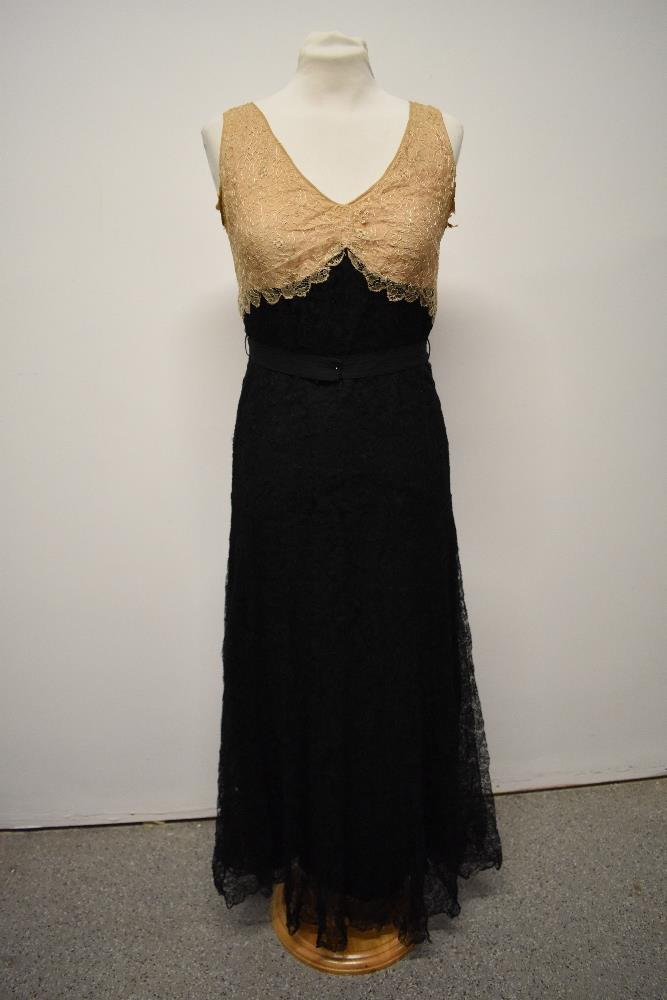 A 1930s two tone cream and black lace evening gown. - Image 2 of 10