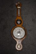 An early 20th century banjo barometer.