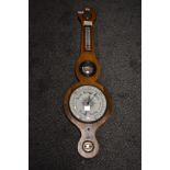 An early 20th century banjo barometer.