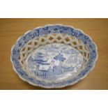 A Victorian Copeland blue and white porcelain chestnut basket with transfer printed design and
