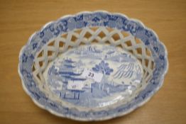 A Victorian Copeland blue and white porcelain chestnut basket with transfer printed design and