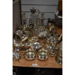 A large selection of assorted plated items including gallery trays, sugar sifters, candlesticks, tea