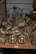 A large selection of assorted plated items including gallery trays, sugar sifters, candlesticks, tea
