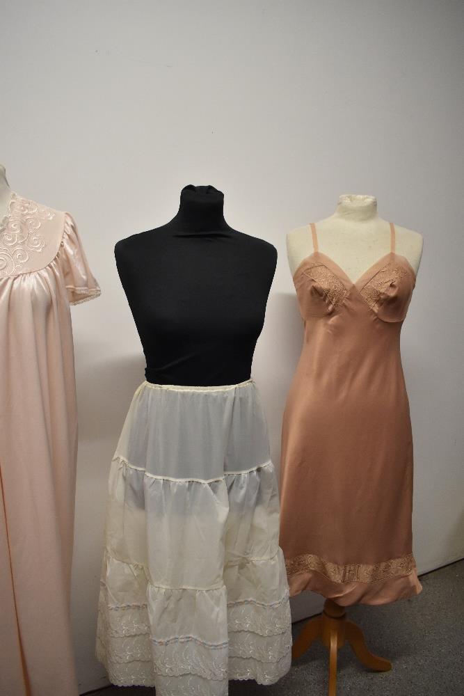 A vintage 1960s St Michaels slip, a 1950s/60s nylon petticoat and a Brettles nightdress. - Image 9 of 9