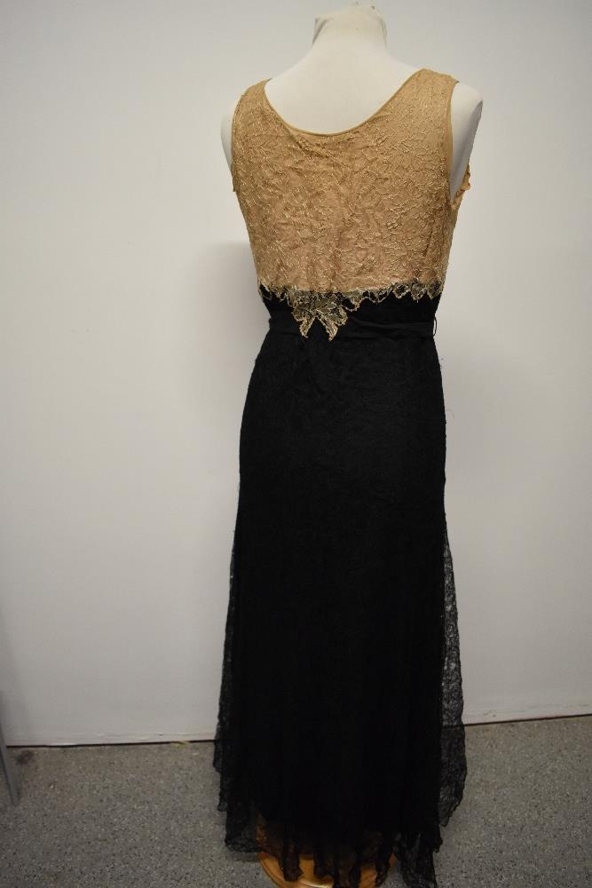 A 1930s two tone cream and black lace evening gown. - Image 10 of 10