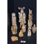 A group of Chinese moulded resin ornaments of deities, the largest measures 20cm tall