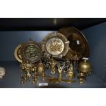 A selection of brass, including bells and large embossed ash tray.